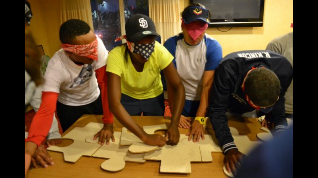 The young coaches participate in cultural enrichment activities focused on perseverance and team work.