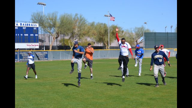 The young coaches warm-up together in the morning.