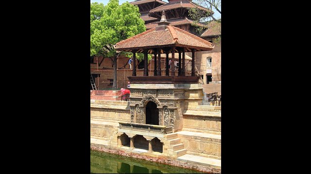 Mahadev Temple, Kathmandu Durbar Square, Nepal: This carved window frame in the temple&#039;s upper wall is an architectural tradition of the Kathmandu Valley.
