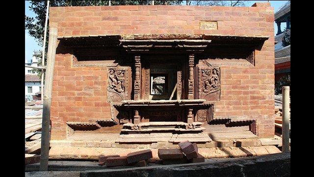 Mahadev Temple, Kathmandu Durbar Square, Nepal: This carved window frame in the temple&#039;s upper wall is an architectural tradition of the Kathmandu Valley.