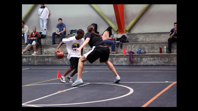 Kayte Christensen demonstrates basketball defense.