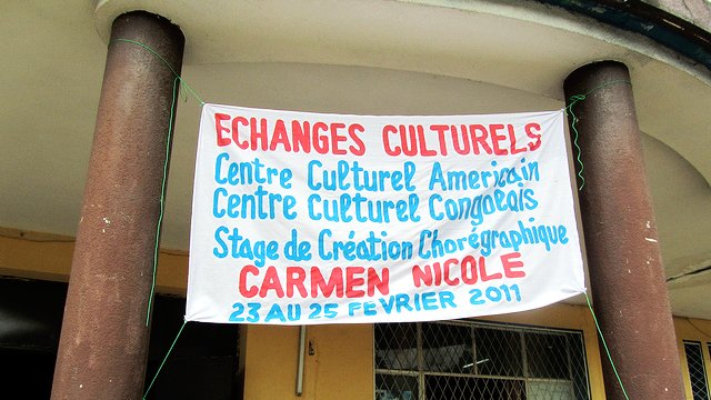 Local artists painted a sign at the Cultural Center where we held some rehearsals.
