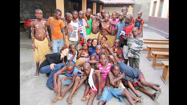 Carmen Smith poses with children from a local shelter.