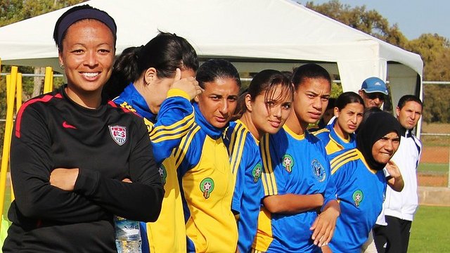 Angie Hucles lines up with program participants during a soccer clinic in Morocco.