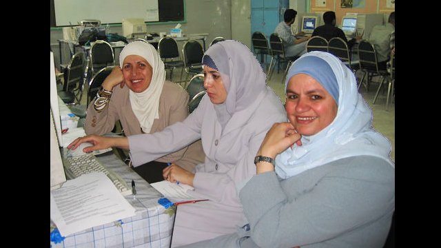 Teachers in Jordan collaborate during an English language workshop.