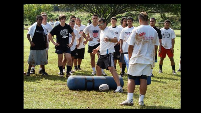 Wesley Clarke of New Zealand Rugby Union teaches rugby drills to youth in Hawaii.