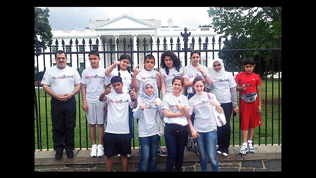 The group enjoys a tour of our nation&#039;s capital and poses in front of the White House.