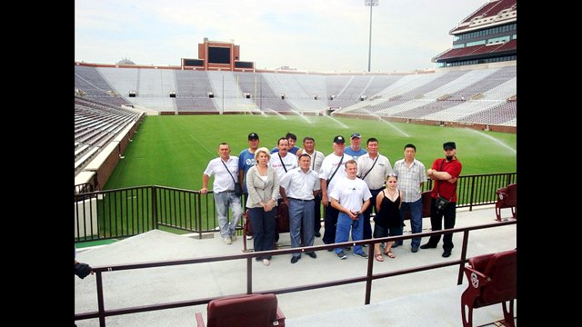 The group tours the football stadium at the University of Oklahoma.