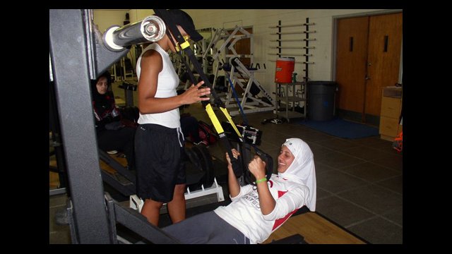 At Hampton University in Hampton, Virginia, the girls learn exercises to build strength. 