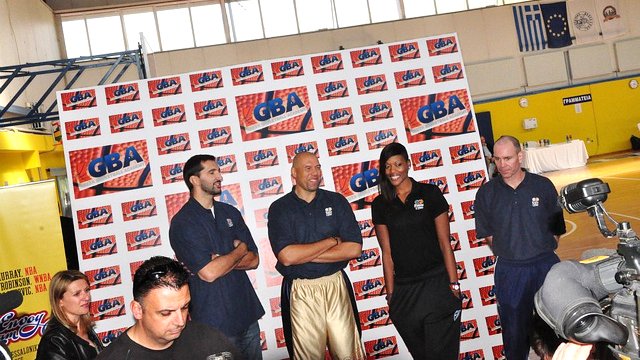 Sports Envoys Tracy Murray, Peja Stojaković, and Ashley Robinson pose at a welcome event by the Greek Basketball Association.