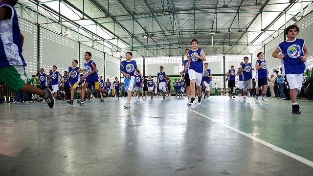 The basketball clinics start with fast-paced warm-up drills.