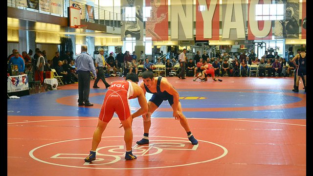A Mongolian male wrestler competes at the New York Athletic Club (NYAC) Holiday International Event.
