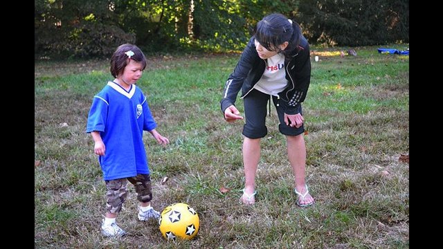 The delegation enjoys a soccer session for athletes with disabilities hosted by TOPSoccer. 