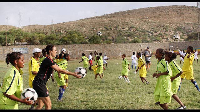Ethiopian girls enjoy a ball handling drill with Kate Markgraf.