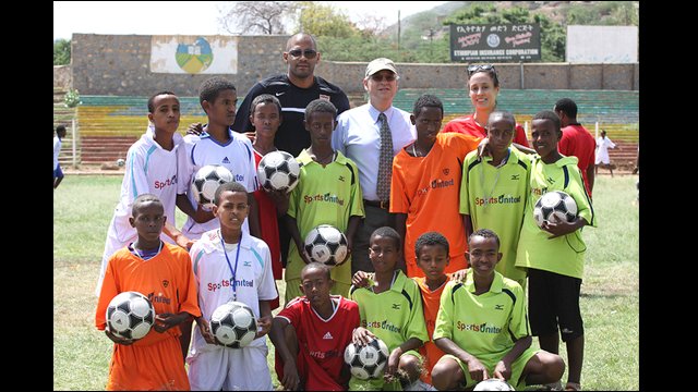 The Ethiopian male soccer players pose for a photo after a practice.