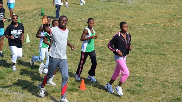 The group warms up for the Mock Olympics.