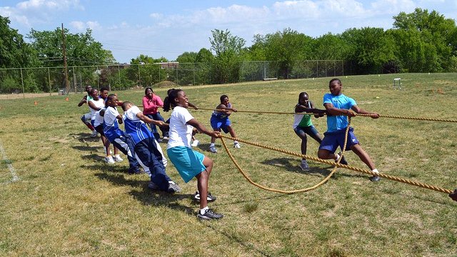 The participants played tug-of-war while working on their teamwork skills.