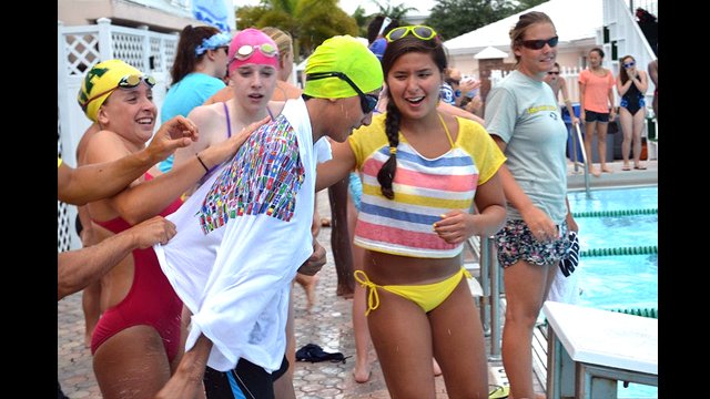 The swimmers dry off after a race.