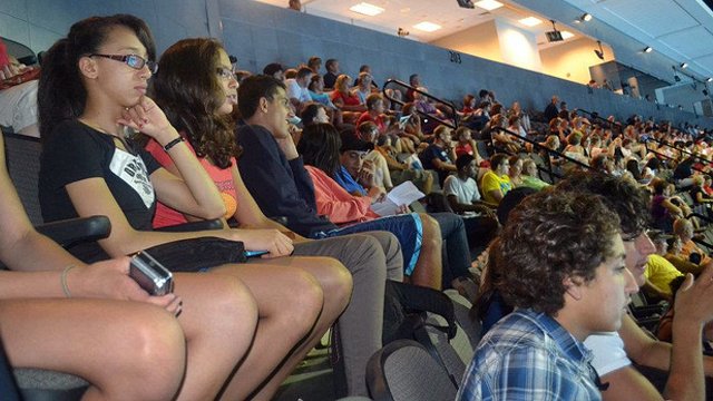 The Tunisian swimmers intently watch the U.S. Olympic Swimming Trials in Omaha, Nebraska.