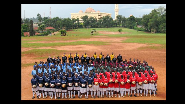 Ugandan soccer coaches pose for a photo with the American soccer coaches