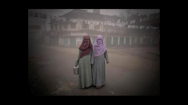 Two young women on their way to work in Comilla