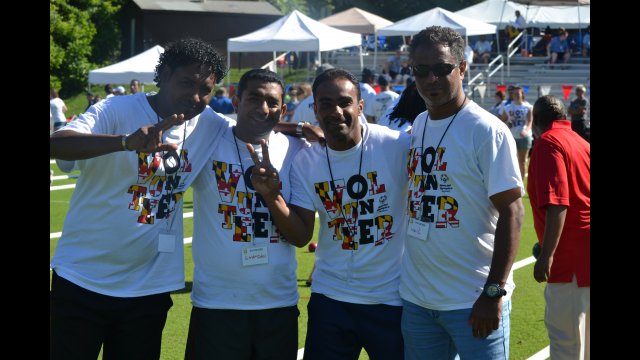 NEA coaches volunteer their time at the Special Olympic Games.