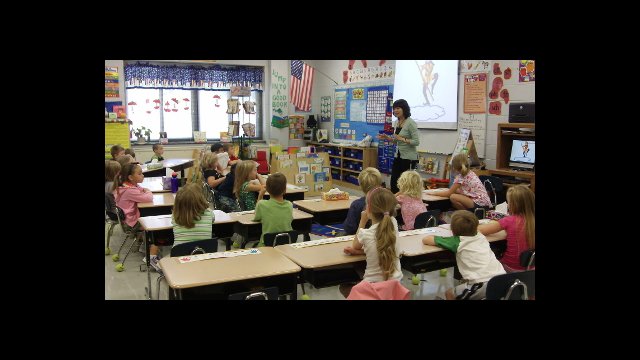 Li Shumeng taught at Cullowhee Valley School in North Carolina during the 2011-2012 school year. In this picture she is introducing the Chinese story of the Monkey King.