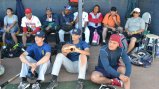 During a time-out, the young coaches receive a history lesson about the World Baseball Classic. 