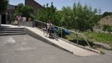 A participant experiences a hand cycle for the first time.