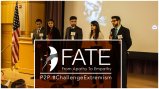 photo of group of people standing in front of podium that says FATE