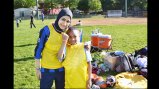 An Egyptian soccer coach poses with another participant at a United for DC volunteer session.