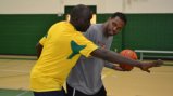 One of the participants shares tips on shooting with a D.C.-area coaching peer. One of the participants shares tips on shooting with a D.C.-area coaching peer.
