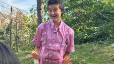 Howey wearing pink Lederhosen while celebrating Oktoberfest