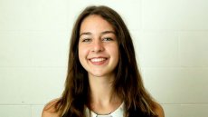 Medium shot of a young lady smiling