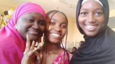 (YES) Abroad participant, Lauryn Ford poses with two Senegalese students