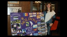 Xenia with her International Education Week presentation board.